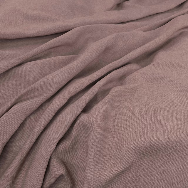 Dusty mauve taupe fabric with fine woven texture falling in soft folds