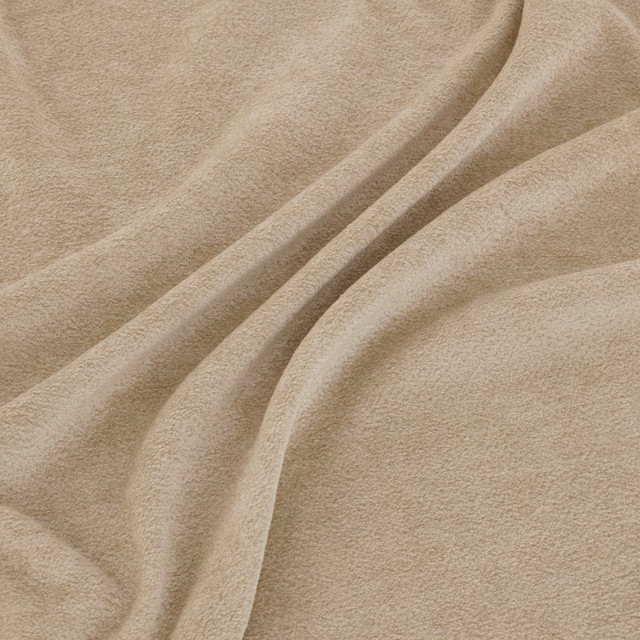 Warm cream Pagani fabric with a softly brushed, suede-like surface in sculpted folds