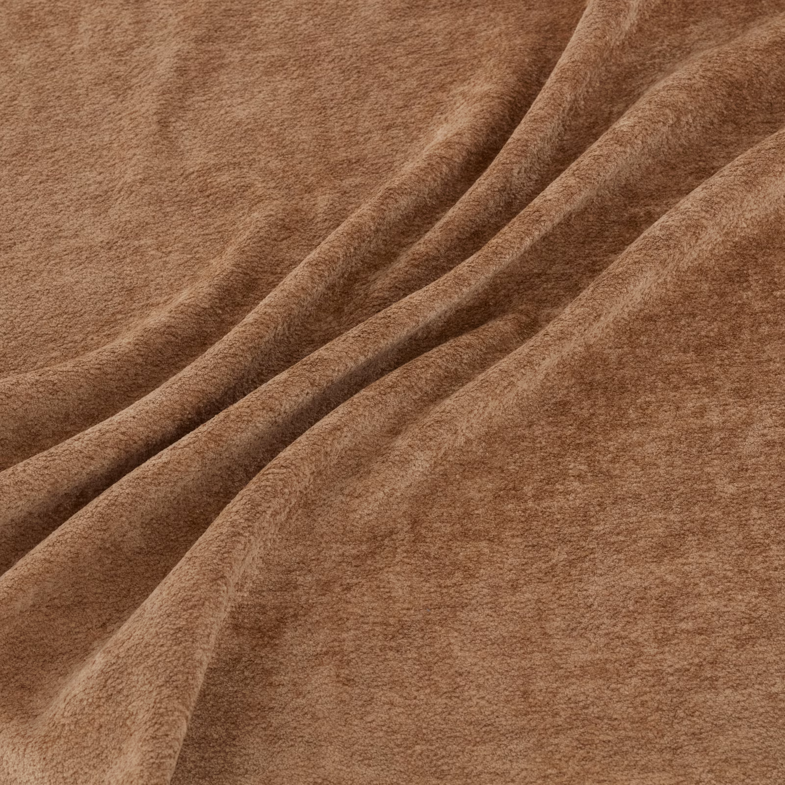 Warm kiln-brown fabric swatch with soft suede-like nap folded into flowing ridges
