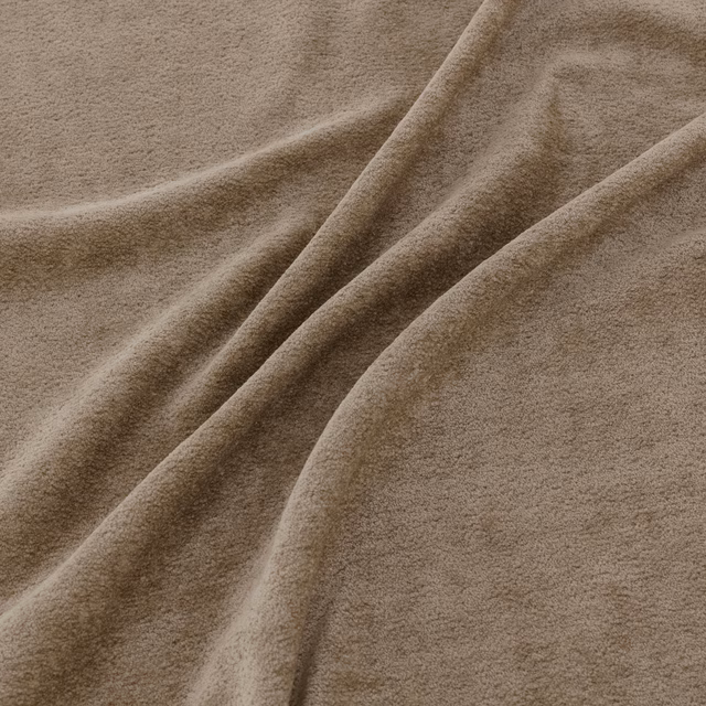 Warm taupe-brown plush textile draped in folds with a softly brushed surface