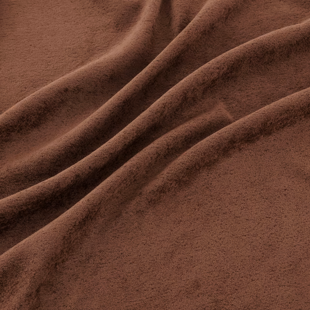 Warm sienna-brown fabric with plush nap and deep diagonal folds