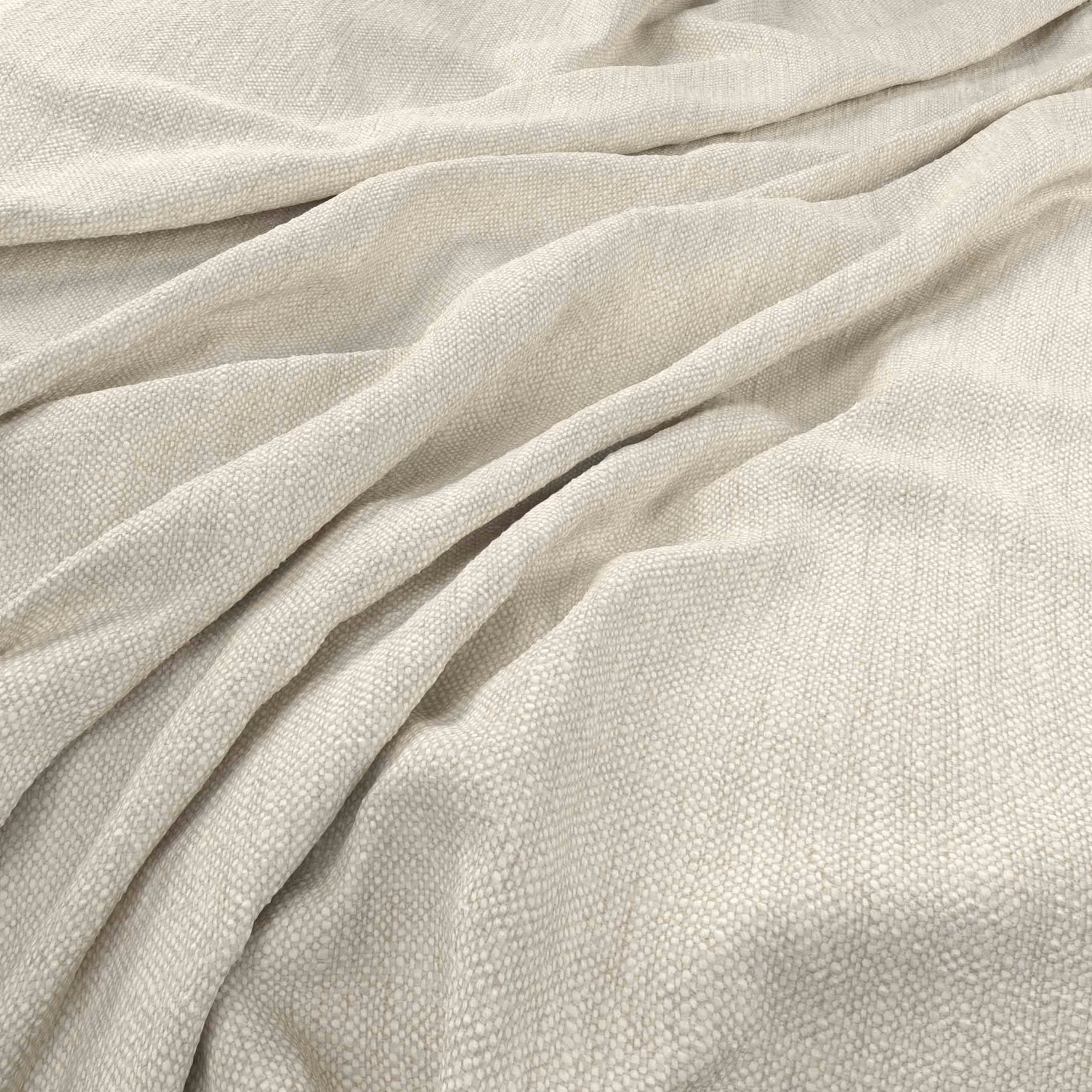 Warm ivory Parker fabric with fine woven texture arranged in softly gathered folds