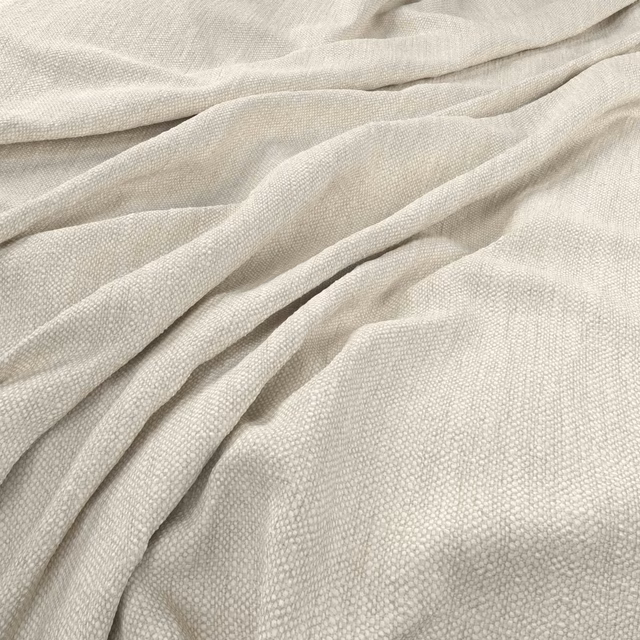 Warm ivory Parker fabric with fine woven texture arranged in softly gathered folds