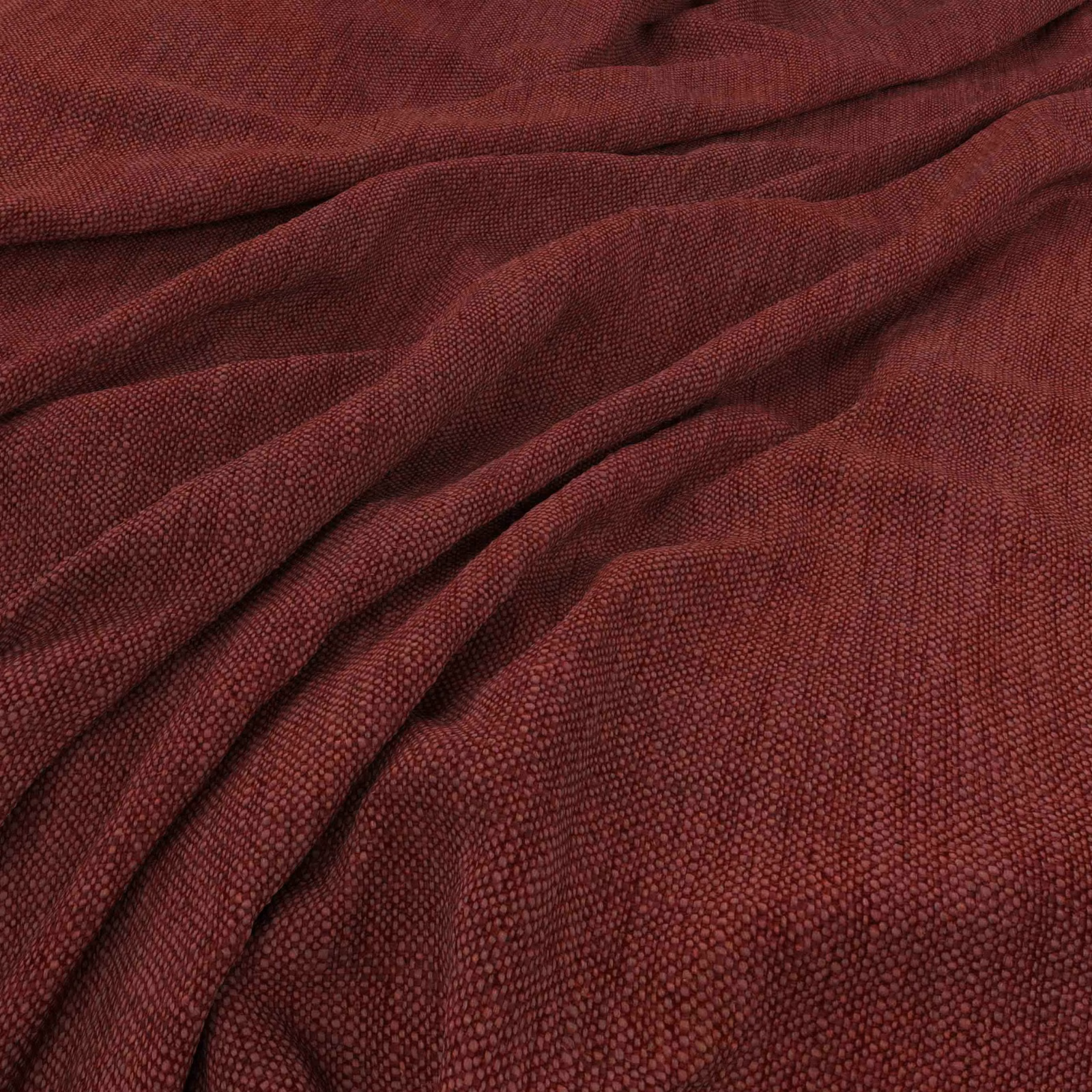 Deep cranberry red fabric with a fine pebbled weave gathered into soft folds