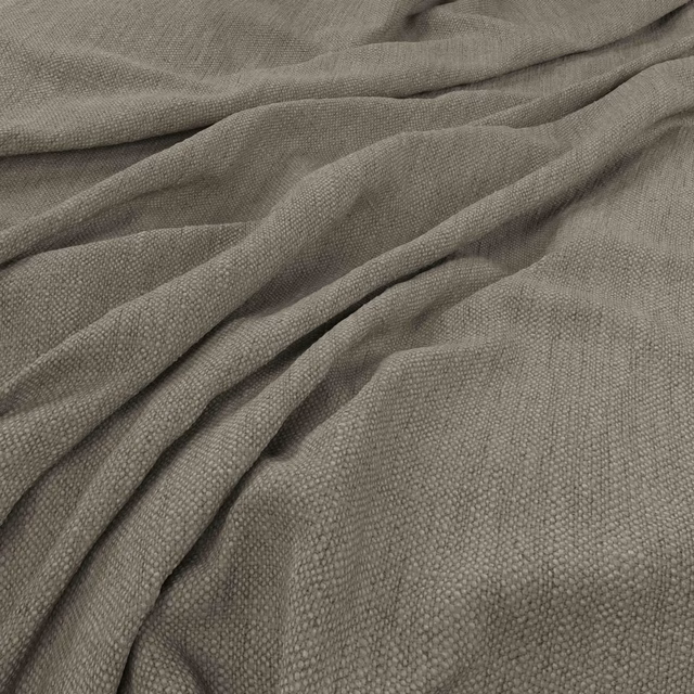 Warm fawn-taupe plain weave fabric gathered into soft textured folds