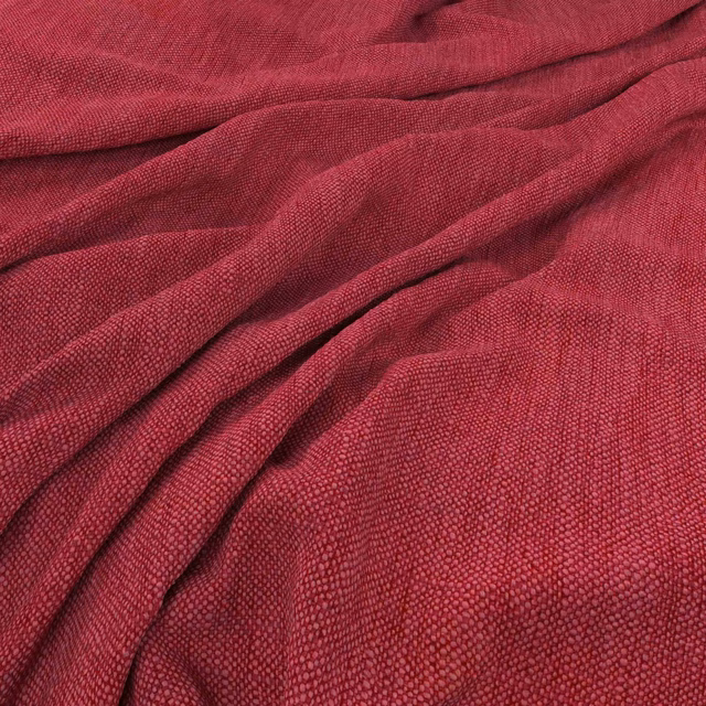 Deep fuchsia woven fabric with fine nubby texture and softly gathered folds