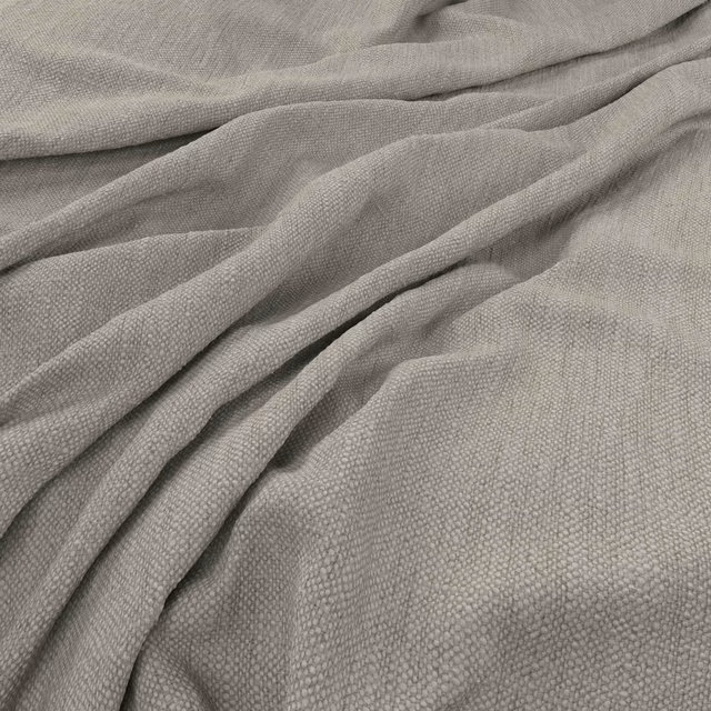 Warm stone-grey plain weave with a softly nubby texture gathered into gentle folds