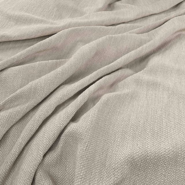Pale greige taupe fabric showing a fine nubby weave in soft draped folds