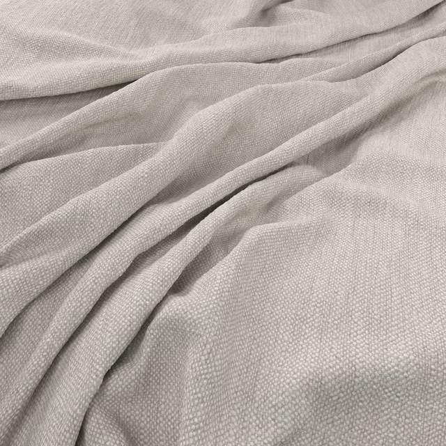 Pale mist-grey woven fabric gathered into soft folds with a fine pebbled texture