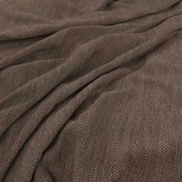 Warm mocha-brown fabric with a fine pebbled weave in gathered folds