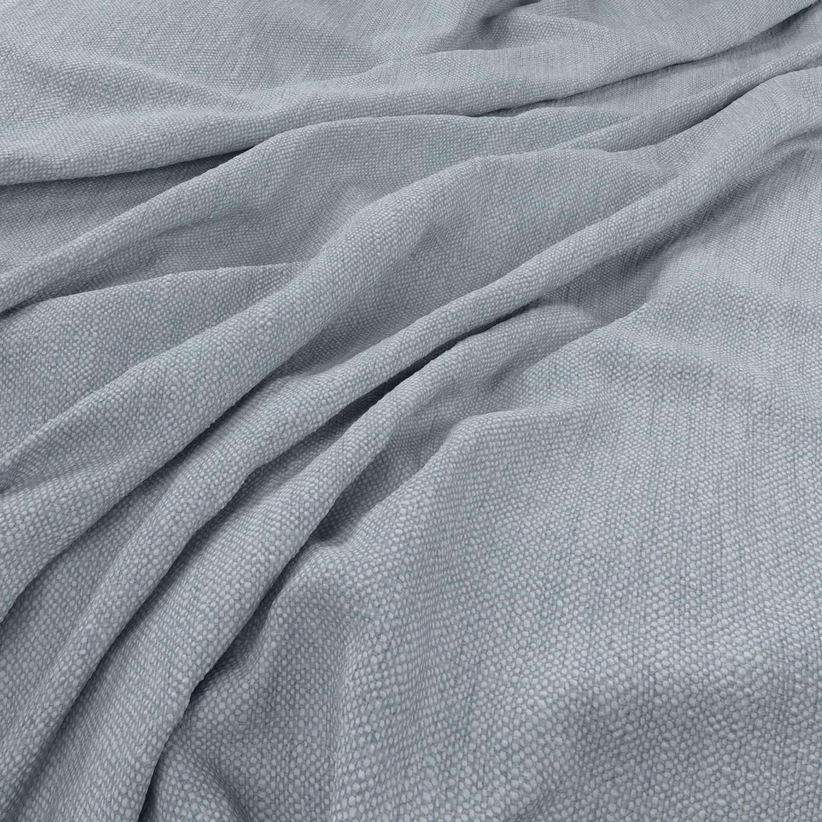 Powder blue-grey woven fabric gathered into soft folds with a fine tactile texture