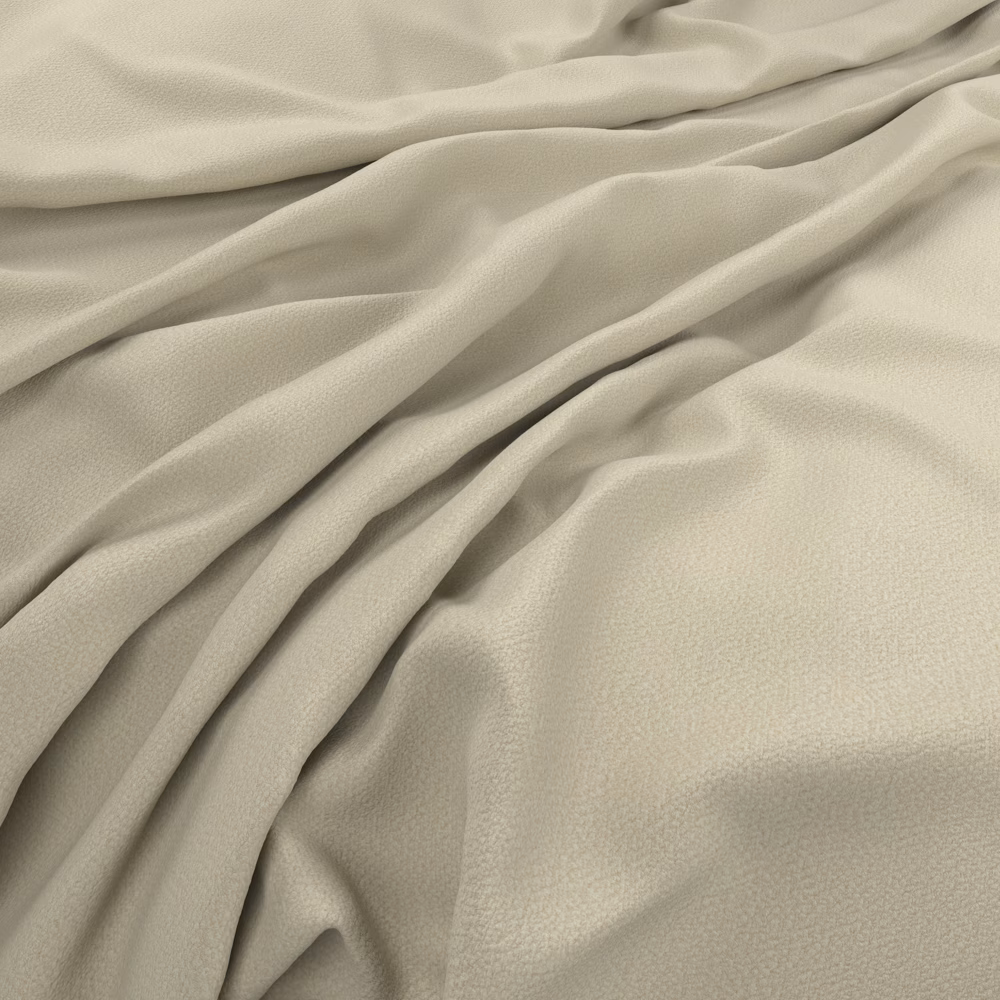 Pale peach-beige fabric draped in soft folds with a fine, subtly pebbled surface