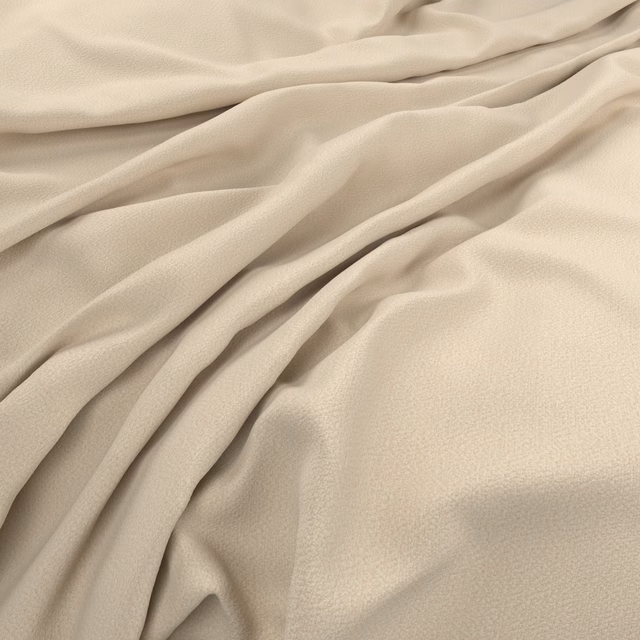 Warm peach-ivory fabric with fine texture folded into soft, fluid drapes