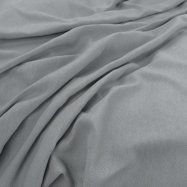 Soft powder-grey fabric with fine peached texture gathered into fluid folds