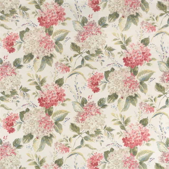 Rose pink and cream floral clusters with sage leaves on an ivory fabric ground