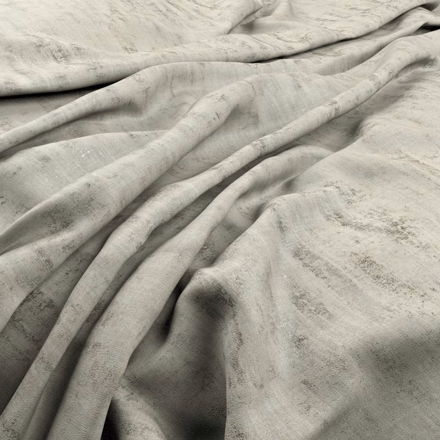 Pale greige fabric with cloudy mottling and soft fluid folds