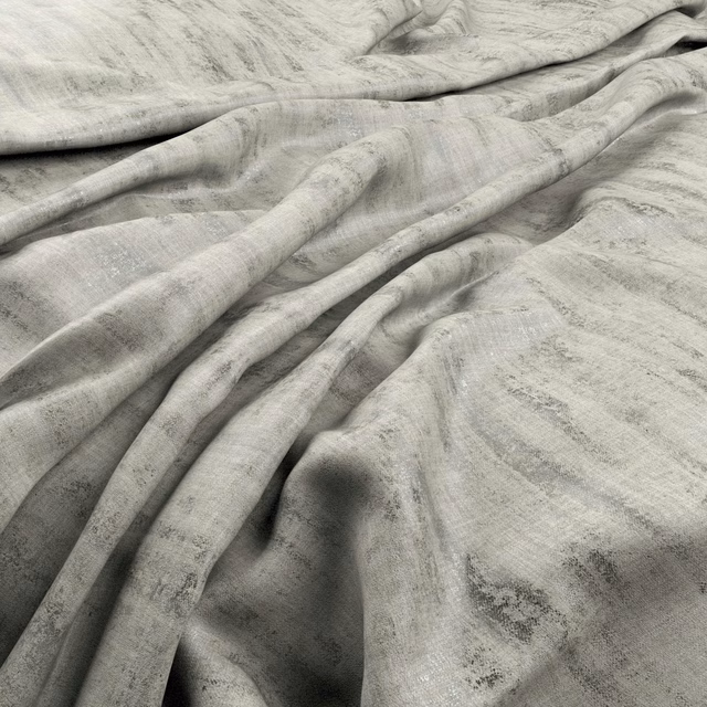Pale quartz-grey fabric with blurred charcoal marbling folded into soft, flowing drapes