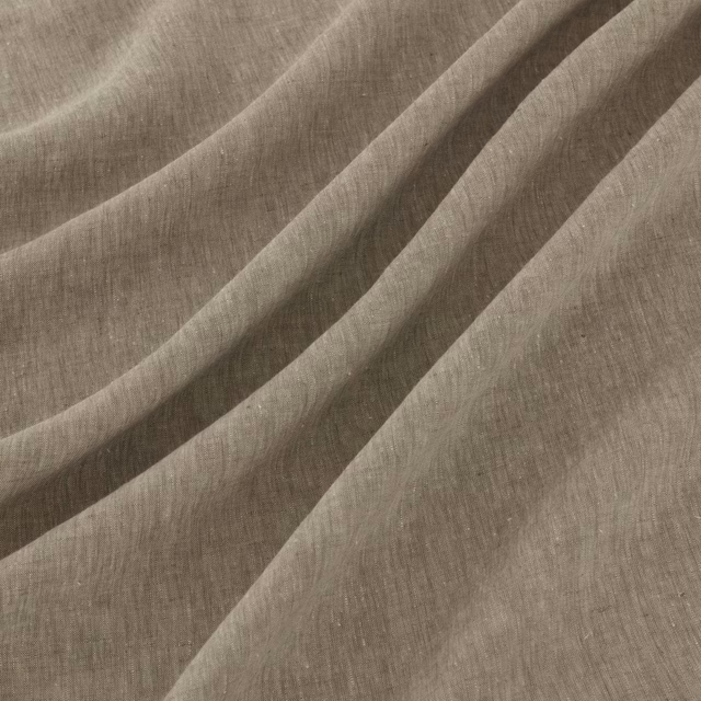 Taupe-grey Pesaro fabric with fine woven texture falling in soft diagonal folds
