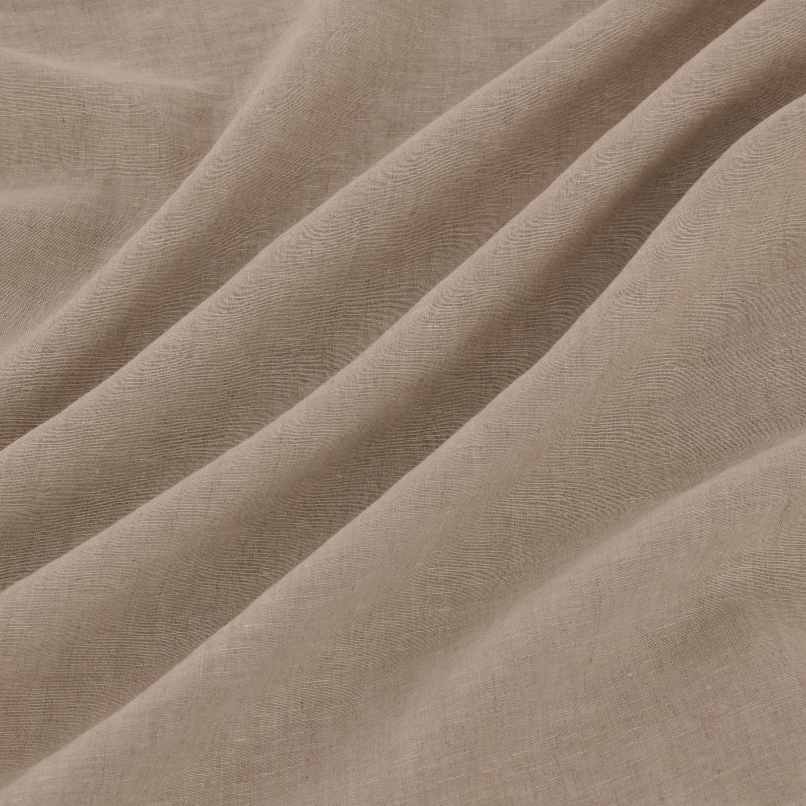 Warm pale taupe woven fabric showing fine crosshatch texture in diagonal folds
