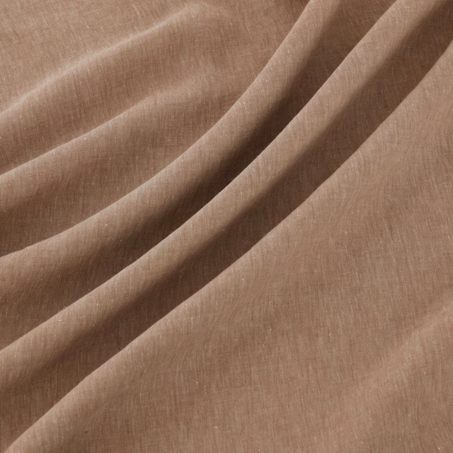 Warm mushroom-taupe fabric with fine slubbed weave arranged in soft flowing folds