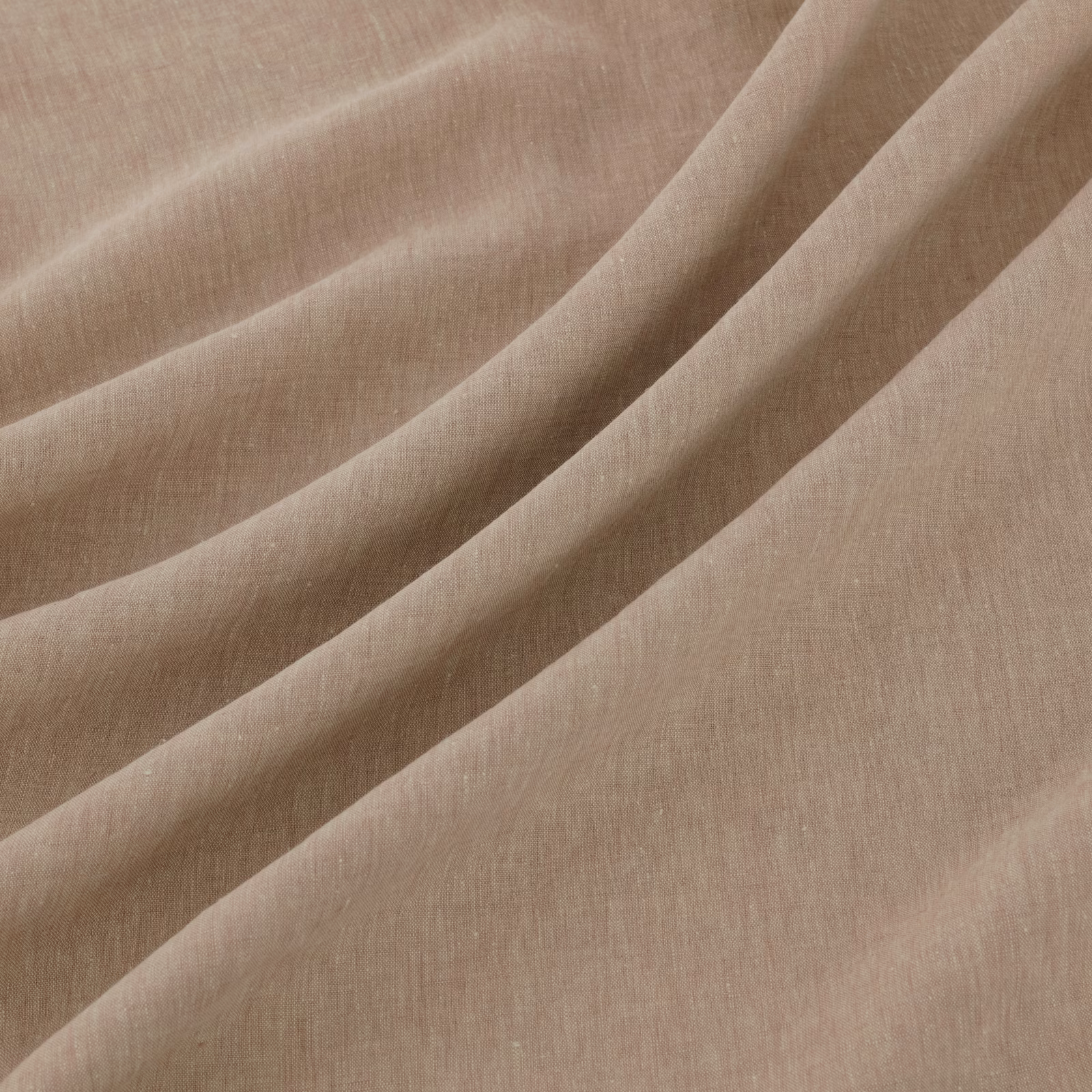 Dusty petal-pink plain weave fabric gathered into softly rounded folds