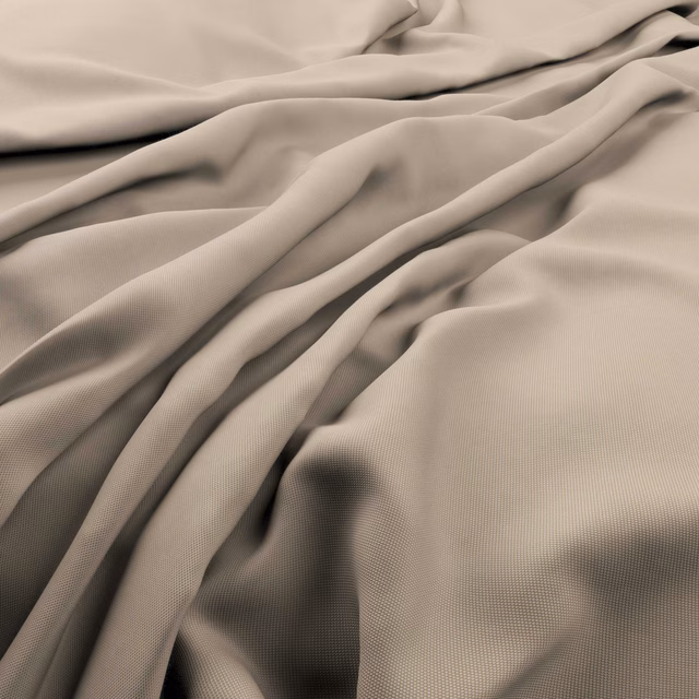 Warm sand-beige fabric with fine ribbed texture folded into fluid shadows