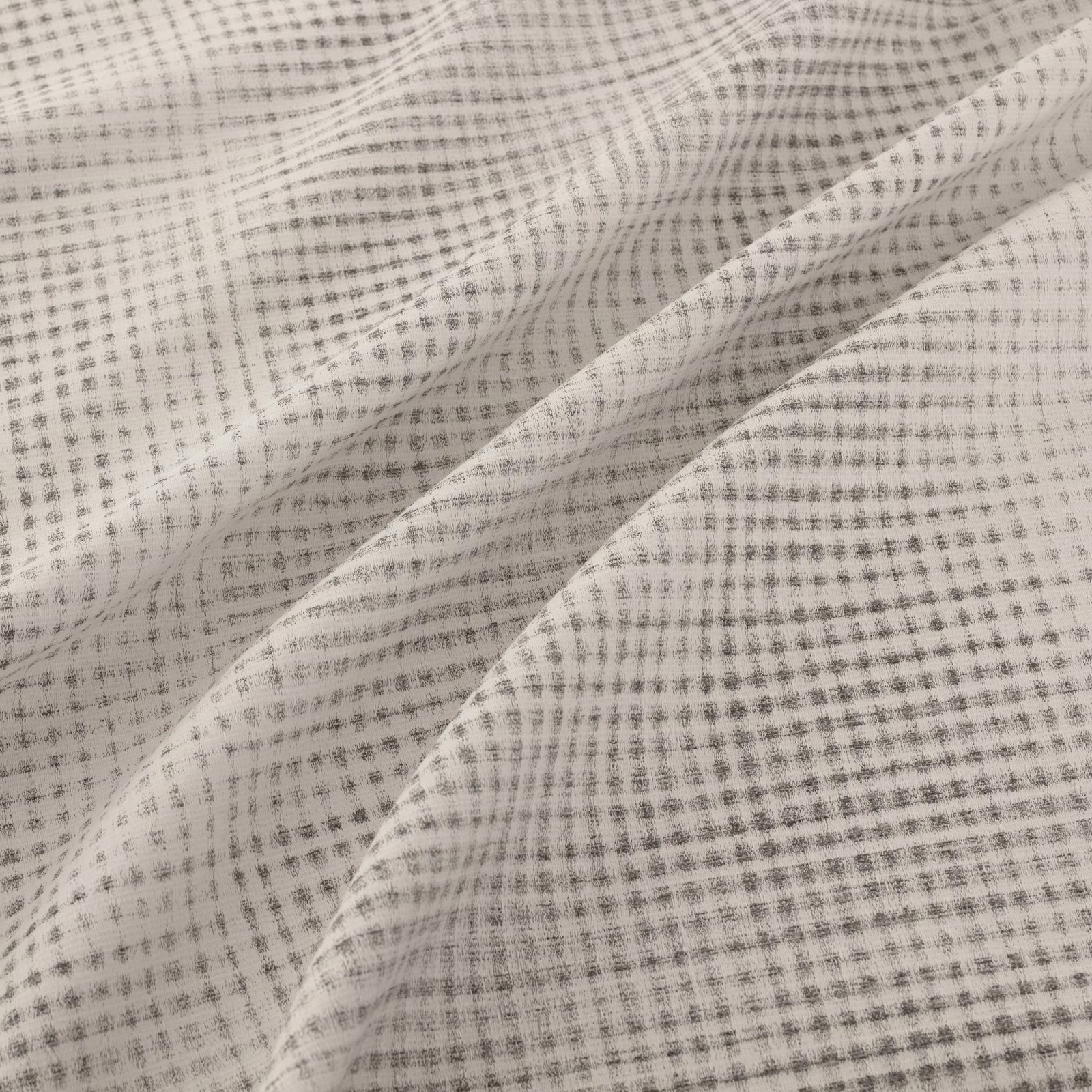 Cool steel-grey woven check with fine ivory lines and softly folded texture