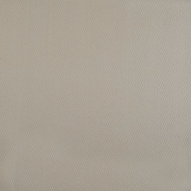 Close-up of pale quartz-taupe fabric with a fine, softly rippled woven texture