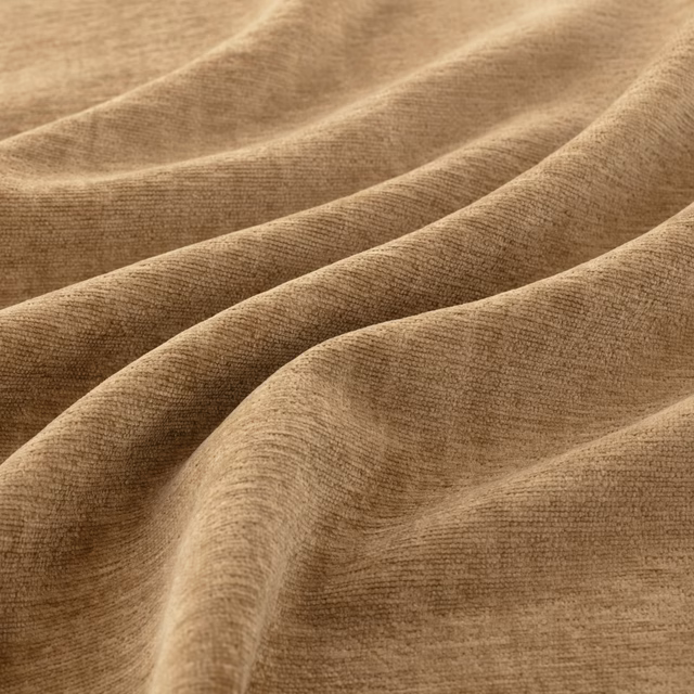 Warm caramel-brown woven fabric with fine ribbing and softly shaded folds