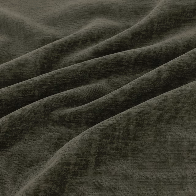 Deep moss-olive plush fabric with charcoal shadows and directional pile texture