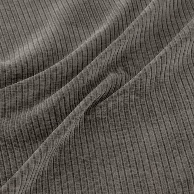 Muted plum-grey woven textile with fine vertical striations and diagonal draped folds.