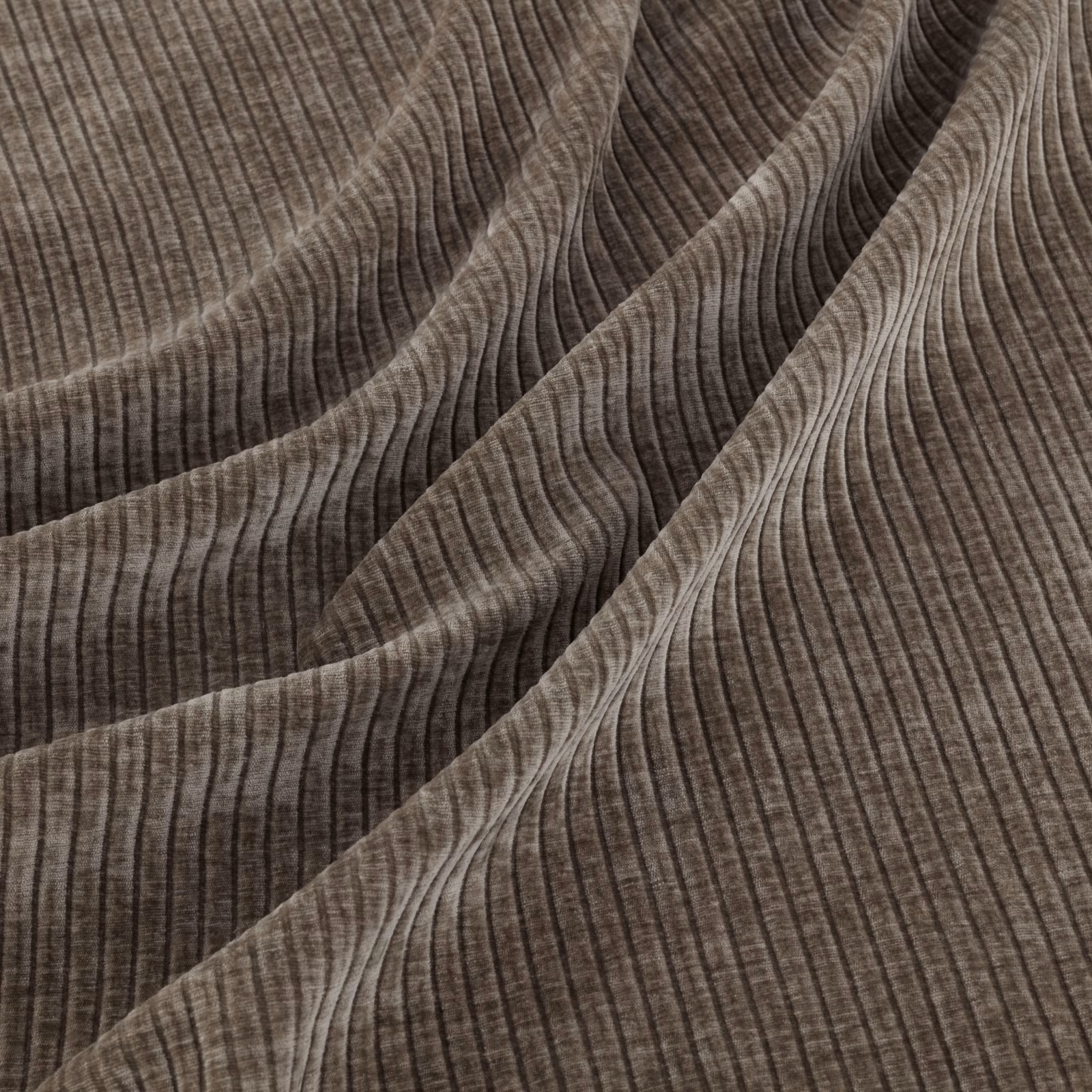 Warm taupe-brown textile with flowing dark ribs and raised vertical texture