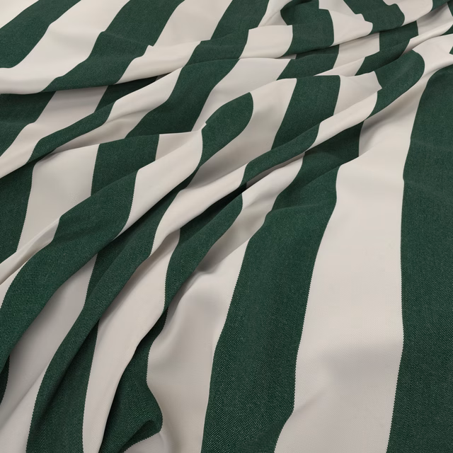 Deep evergreen and ivory irregular stripe fabric with a softly textured woven surface