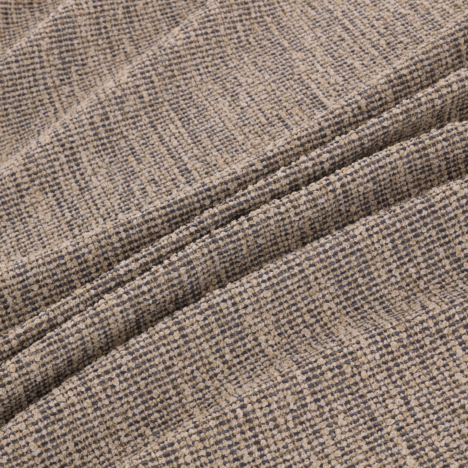 Close-up of warm greige Rimini fabric with charcoal flecks and nubby woven texture