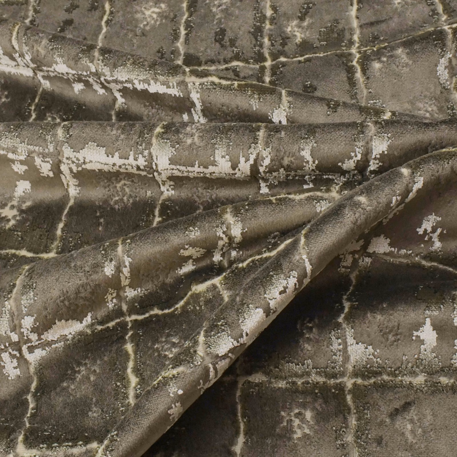 Bronze olive fabric with lustrous surface and distressed pale grid markings
