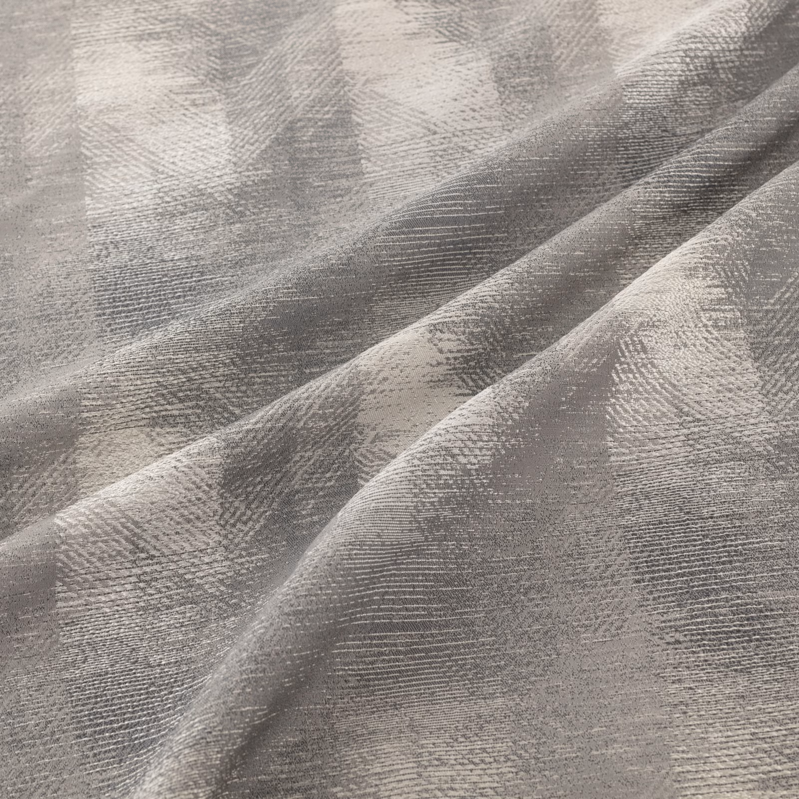 Cool steel-grey woven surface with painterly tonal bands and fine horizontal striations