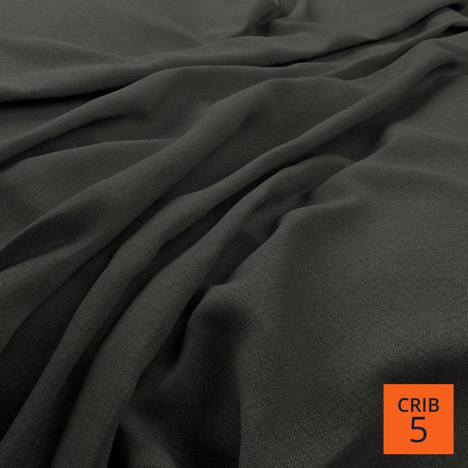 Deep gunmetal grey plain weave fabric falling in soft, shadowed folds