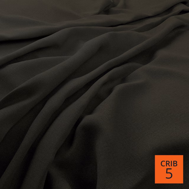 Deep slate-grey fabric falling in soft folds with a fine, even weave
