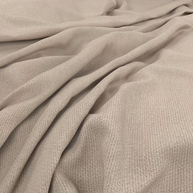 Warm taupe Saga Balm fabric showing a fine grid weave in soft folds