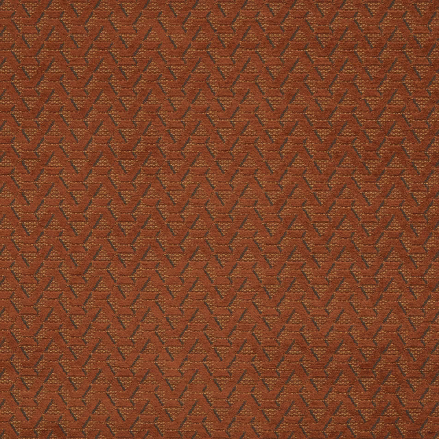 Burnt orange geometric woven fabric with small zigzag pattern and dark contrast threads