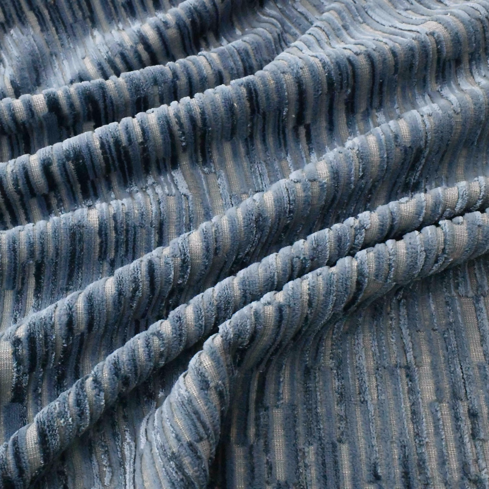 Cool lapis-blue ribbed textile with misty grey stripes and plush corded texture