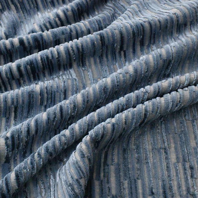 Cool lapis-blue ribbed textile with misty grey stripes and plush corded texture