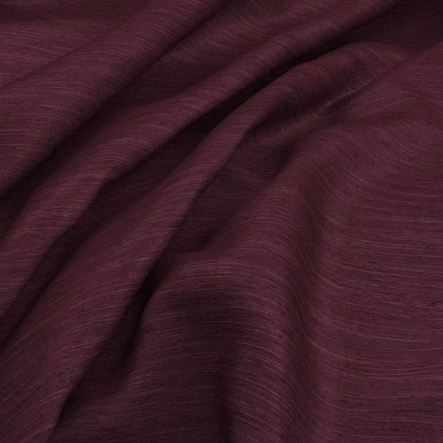 Deep aubergine Sari fabric with fine horizontal slub texture in soft folds