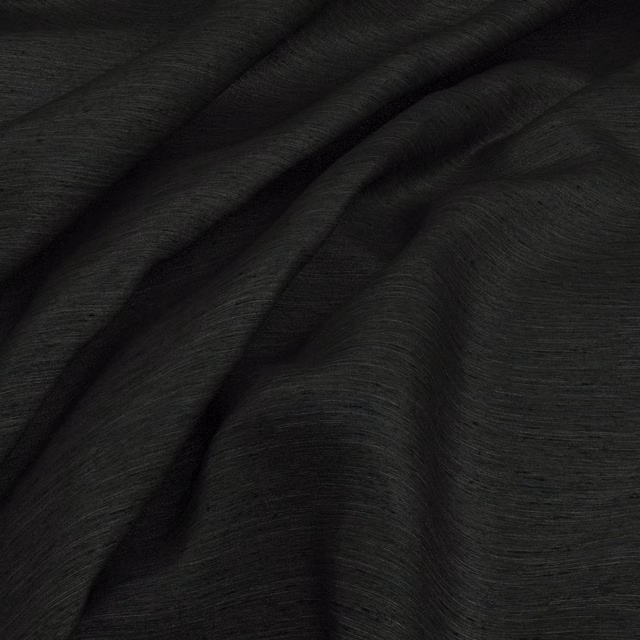 Deep charcoal woven fabric with fine horizontal texture gathered into soft, sculptural folds