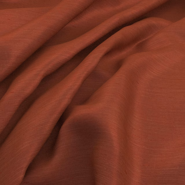 Deep burnt terracotta fabric with fine horizontal slub texture in soft folds
