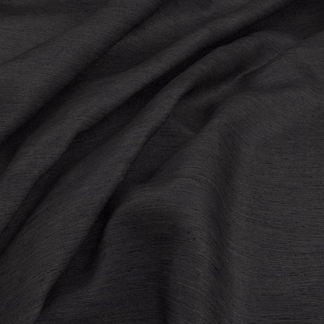 Deep charcoal slate fabric with fine horizontal weave gathered into soft folds