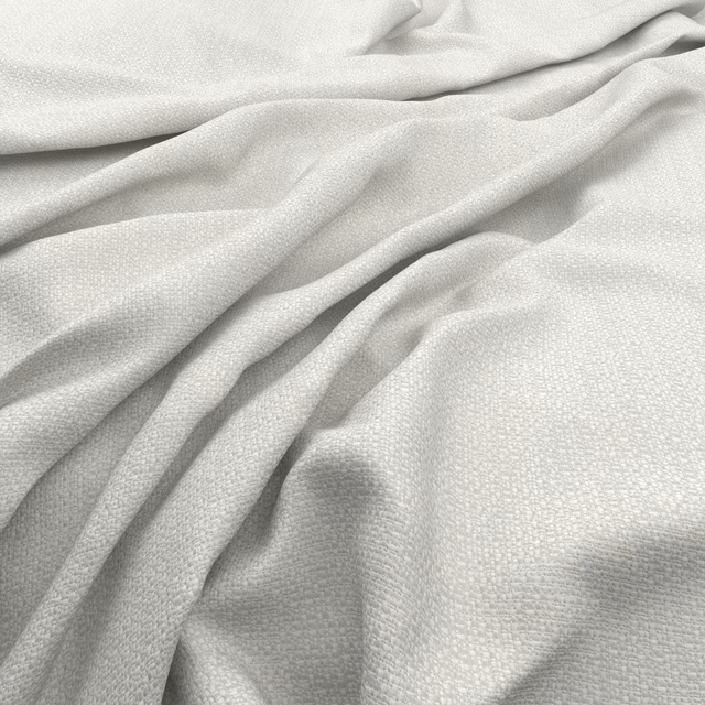 Warm ivory nougat fabric with a fine pebbled weave, draped in soft folds