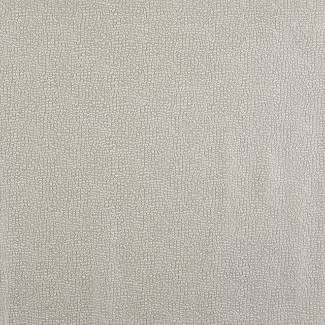 Pale ivory textile with dense irregular pebble-like surface texture
