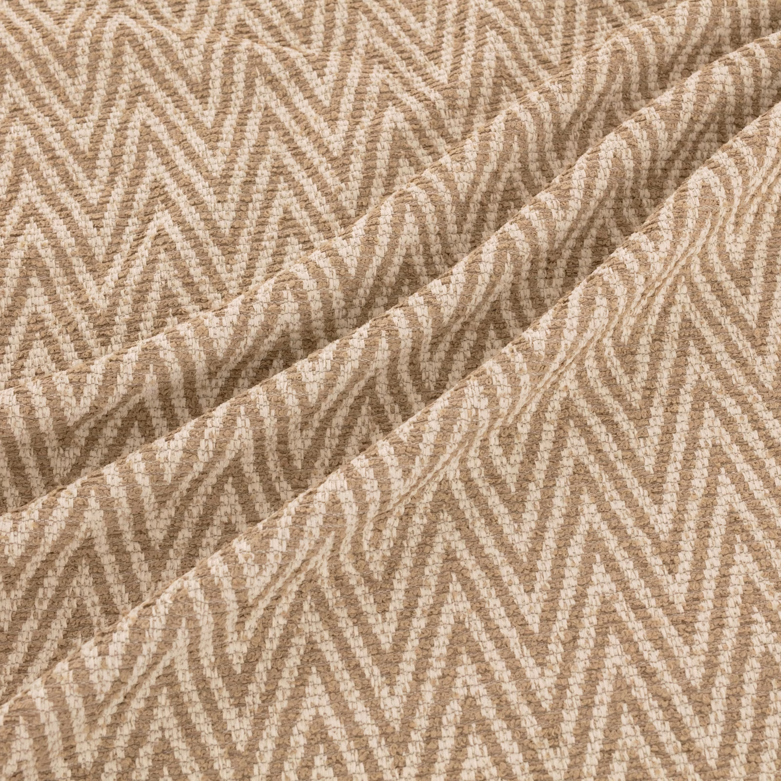 Warm desert-beige woven swatch with cream and taupe broken zigzag texture