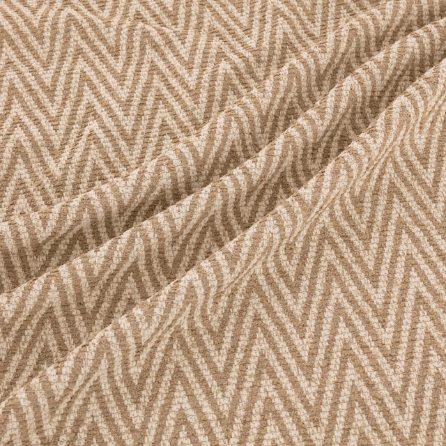 Warm desert-beige woven swatch with cream and taupe broken zigzag texture